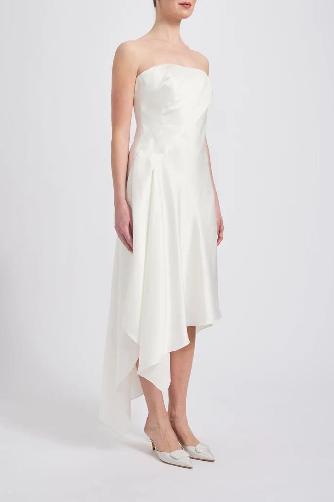 Fluid satin asymmetric handkerchief strapless dressShown in Ivory Simple atmo spheric beautiful and unique desig