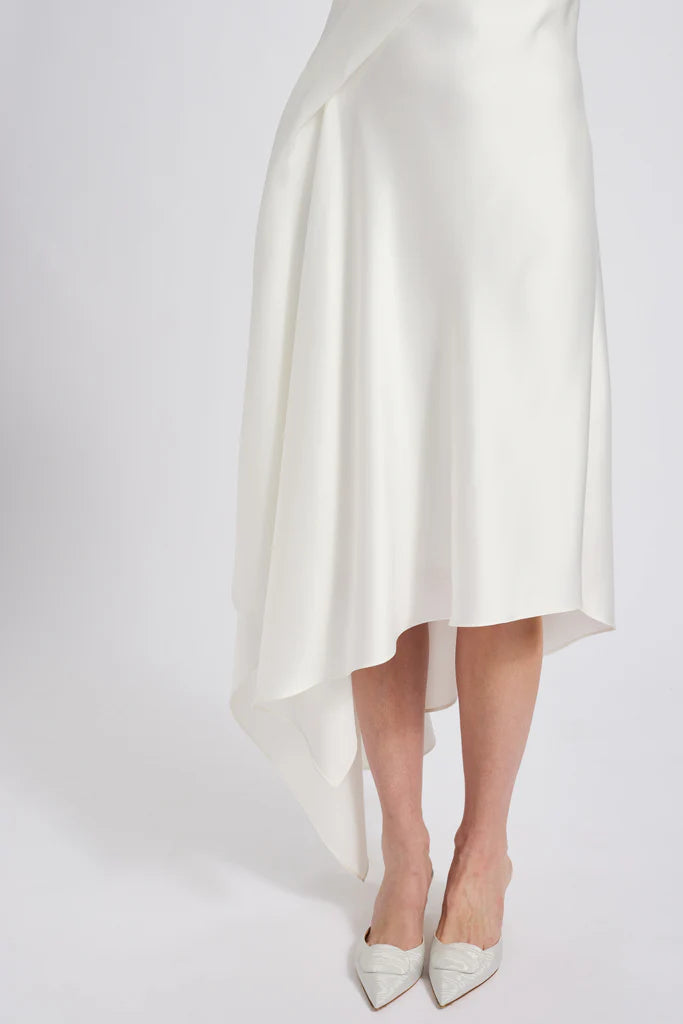 Fluid satin asymmetric handkerchief strapless dressShown in Ivory Simple atmo spheric beautiful and unique desig