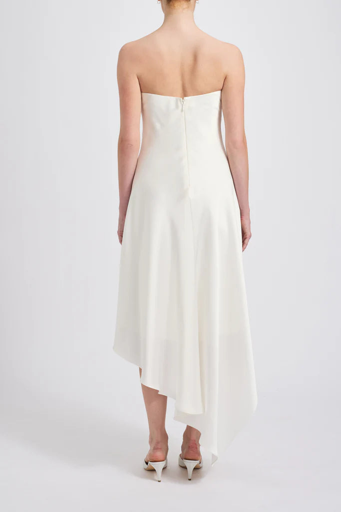 Fluid satin asymmetric handkerchief strapless dressShown in Ivory Simple atmo spheric beautiful and unique desig