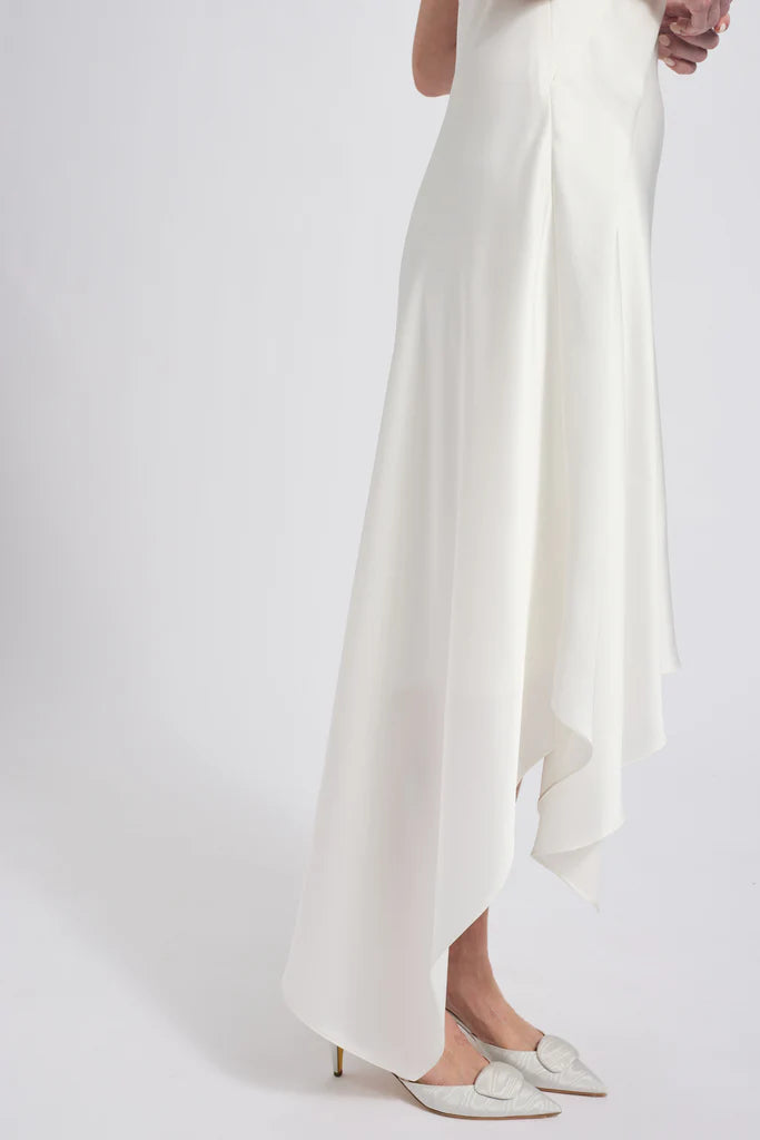 Fluid satin asymmetric handkerchief strapless dressShown in Ivory Simple atmo spheric beautiful and unique desig