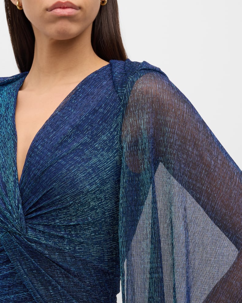 Matrix Metallic Cape Twisted Trumpet Gown Beautiful and charming simple and unique design