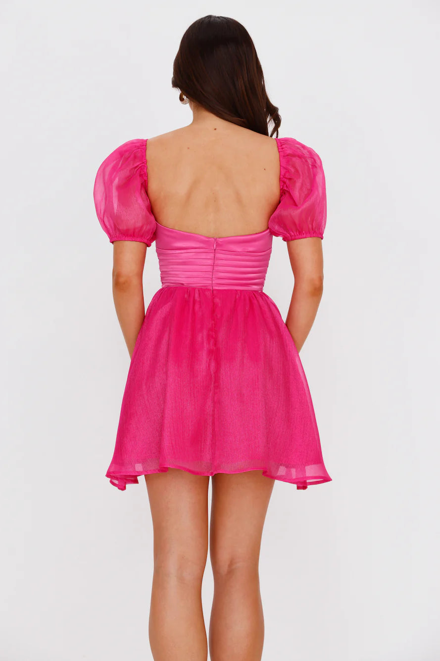Bright pink dress with heart-shaped neckline and bubble short sleeves suitable for dates, parties, and other occasions
