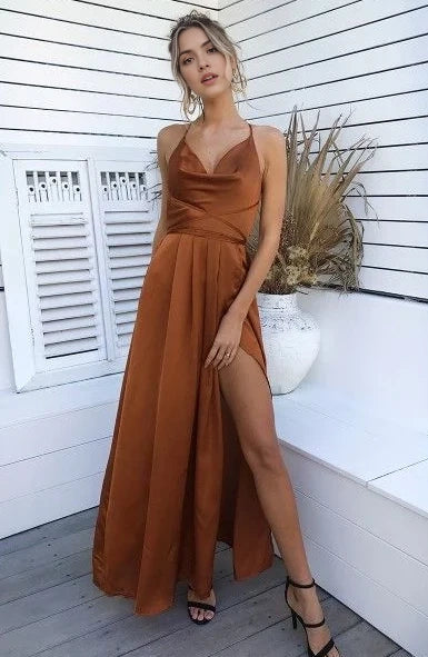 A brown toned long camisole dress with a deep V-neckline design suitable for dinners, parties, etc
