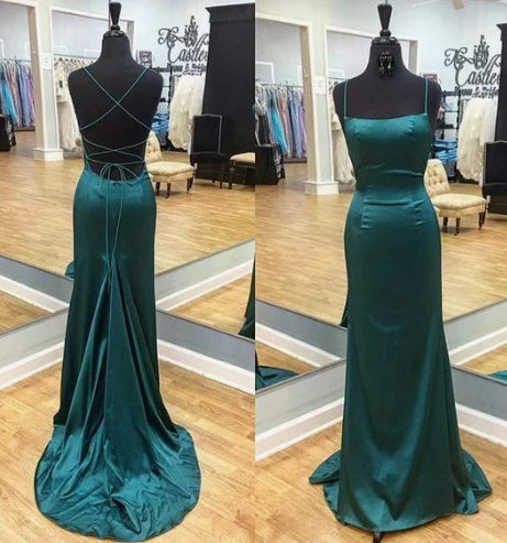 A dark green satin dress with a camisole square neckline and crossed straps at the back, suitable for dinners, dances, and other events