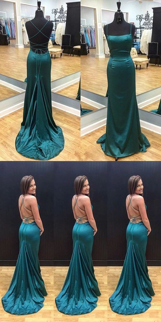 A dark green satin dress with a camisole square neckline and crossed straps at the back, suitable for dinners, dances, and other events