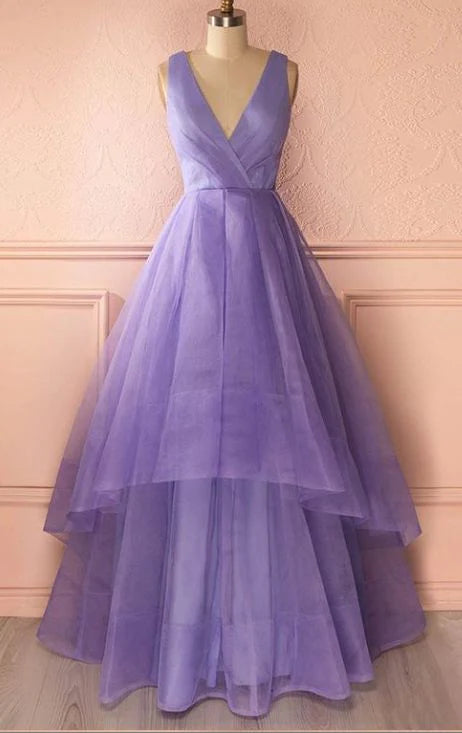 A light purple dress with a deep V-neck sleeveless design that is lightweight and dreamy, suitable for occasions such as dinners and dances