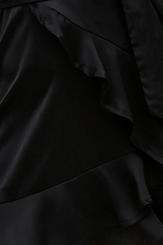 Black camisole short skirt with deep V-neck and thin camisole design. The skirt has multiple layers of ruffle edges, suitable for parties, dates, etc