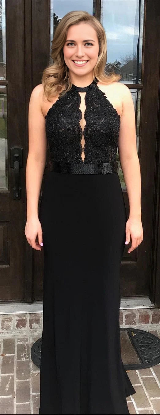 Black sleeveless long dress with a hanging neck design and exquisite lace and sequin decorations on the upper body, suitable for dinners, dances, etc
