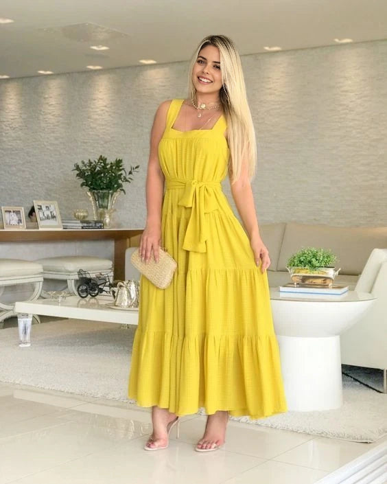 Bright yellow camisole long dress with square neckline and multiple layers of ruffled hem at the bottom of the camisole, suitable for daily outings, dates, or vacations