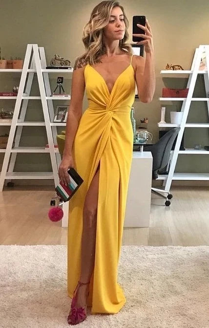 Bright yellow long camisole dress with deep V-neckline design suitable for dinners, parties, red carpets, etc