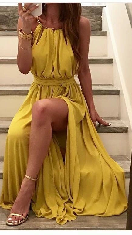 Bright yellow long dress with neck collar, cinched waist tie, high slit hem suitable for vacations and dinners