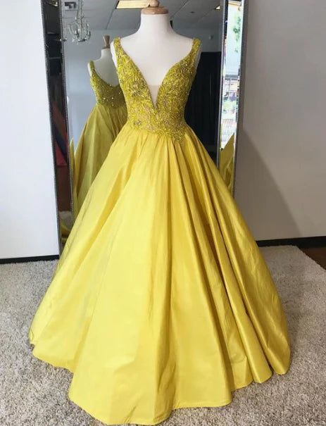 Bright yellow satin dress with deep V-neck design and exquisite bead embroidery decoration on the upper body