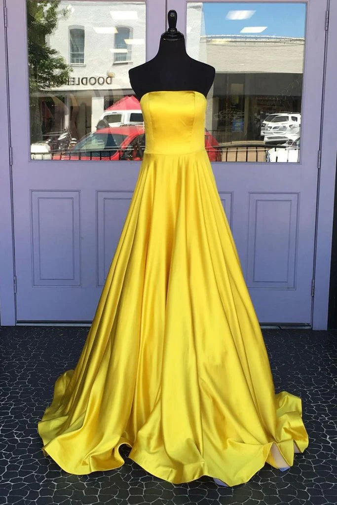 Bright yellow satin dress with strapless design suitable for dinners, dances, and other occasions