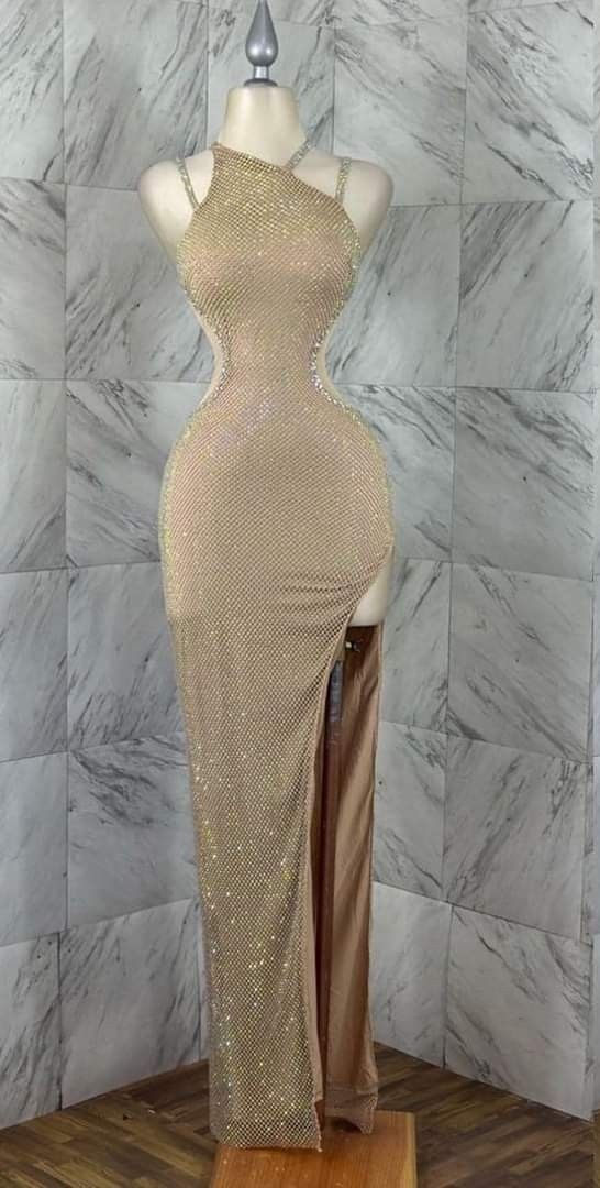 Champagne gold dress adorned with sparkling rhinestones featuring a hanging neck design and high slit, slim fit