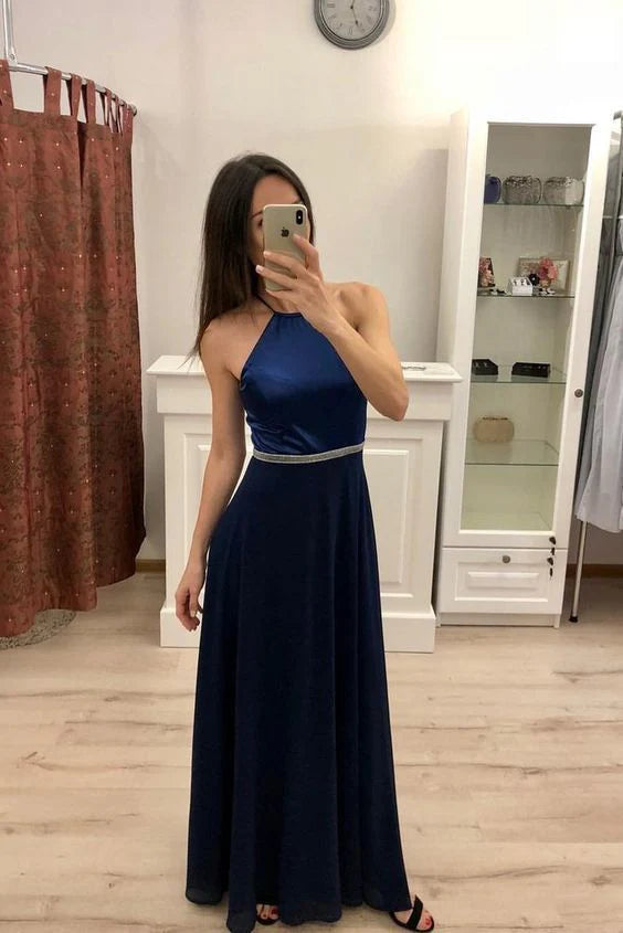 Deep blue long dress with neck hanging collar and sleeveless design suitable for dinners, dances and other occasions