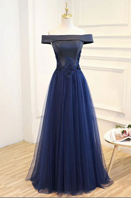 Deep blue off shoulder dress with a one shoulder design and exquisite lace embroidery on the upper body