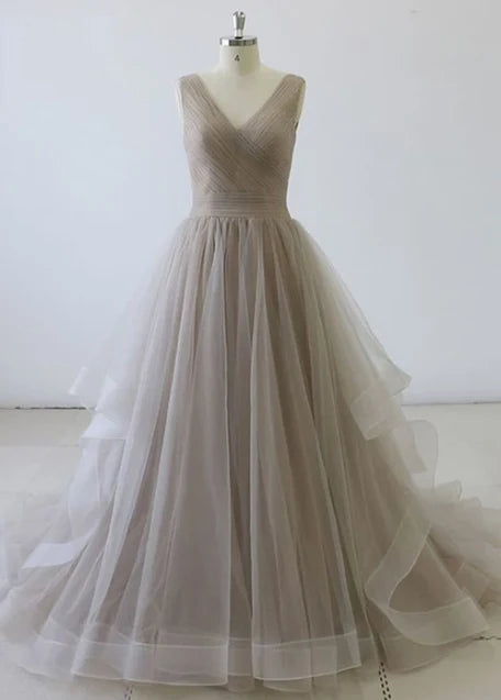 Light gray wedding dress with sleeveless deep V-neck and cross pleated upper body design for occasions such as dinners