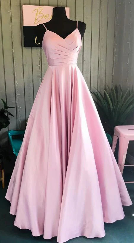 Light pink satin dress with suspender and deep V-neck, suitable for occasions such as dinners and dances