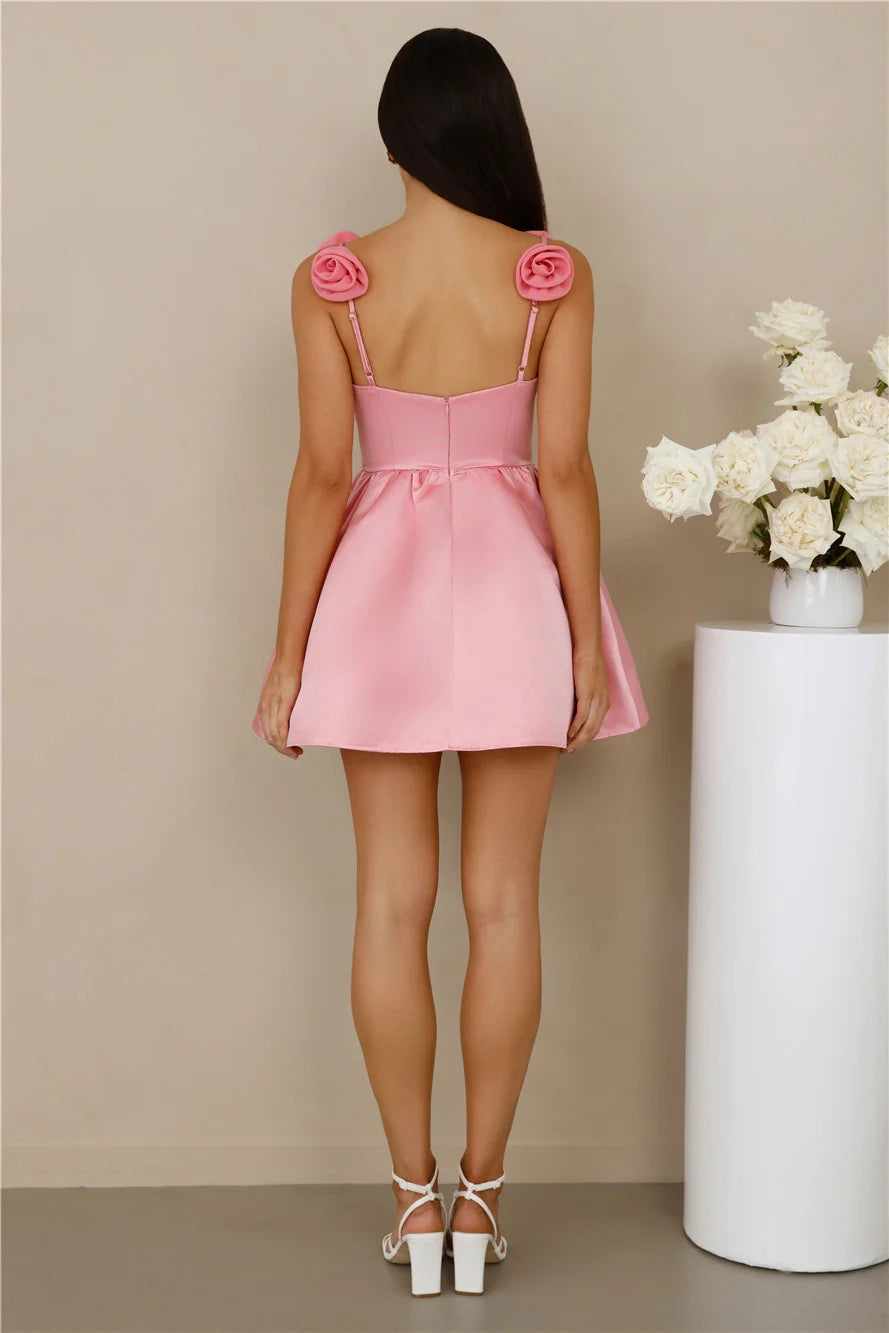 Pink satin dress with three-dimensional flower decorations on the shoulder straps and hollow designs on the chest and waist, suitable for parties, dates, and other occasions