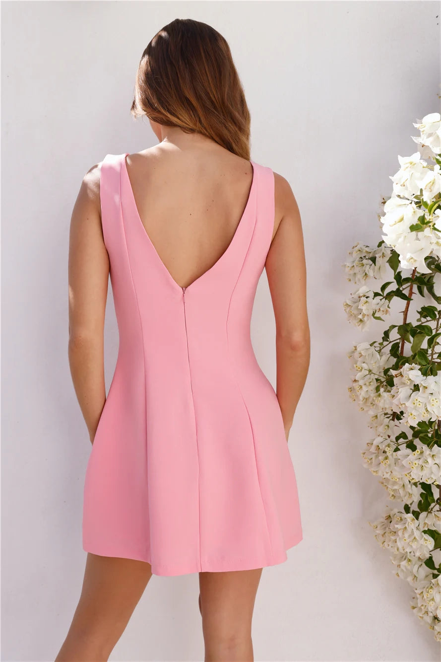 Pink sleeveless short dress with round neck design suitable for daily outings, dates, etc