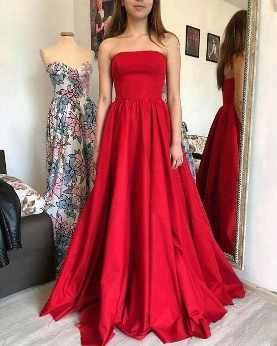 Red strapless long dress with high waist and large skirt suitable for dinners, dances, and other occasions