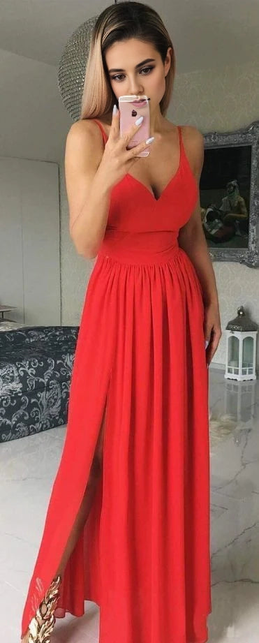 Red suspender long dress with deep V-neckline and pleated elements, suitable for dinners, dances, etc