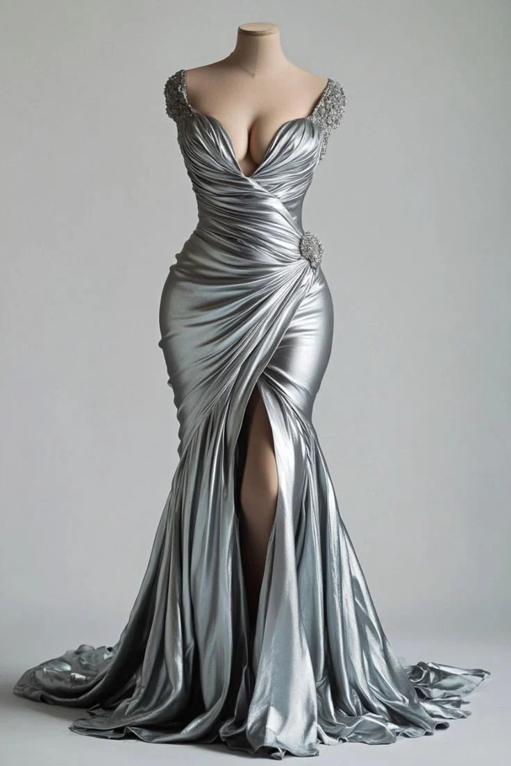 Silver satin fishtail dress with deep V-neck and diamond embellished short sleeved cross pleated waist and side slit