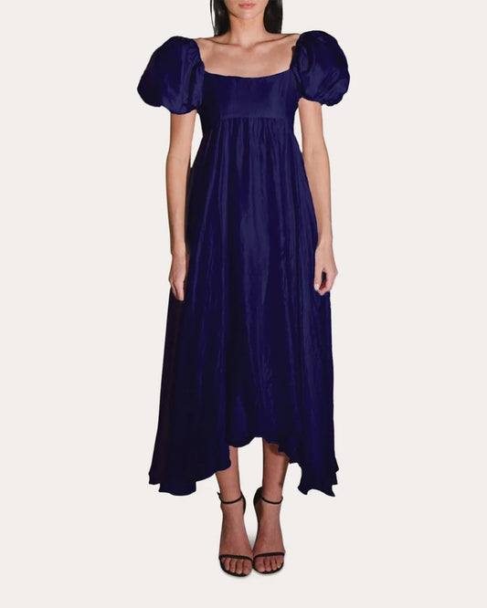The raw silk silhouette falls in gathered form from its empire waistline to asymmetric midi hem simple gentle atmospheric and unique desi Bring summer colors to enhance whiteness