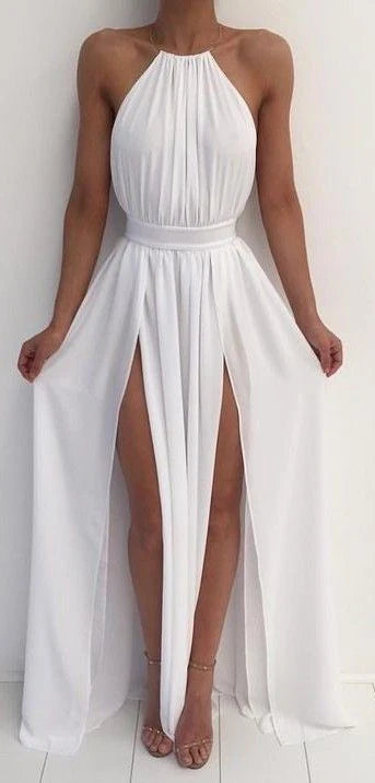 White hanging neck jumpsuit with high waist design, paired with double-sided high slit skirt, sleeveless high neck,