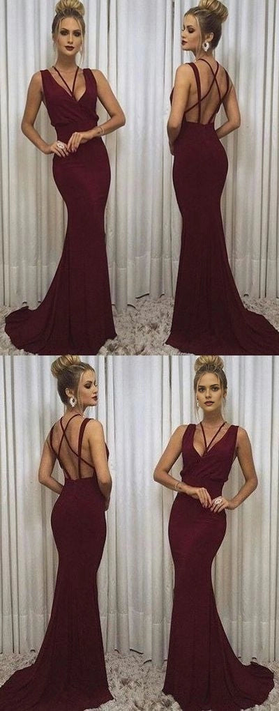 Wine red long dress with deep V-neck and cross straps suitable for dinners, red carpets, parties, etc